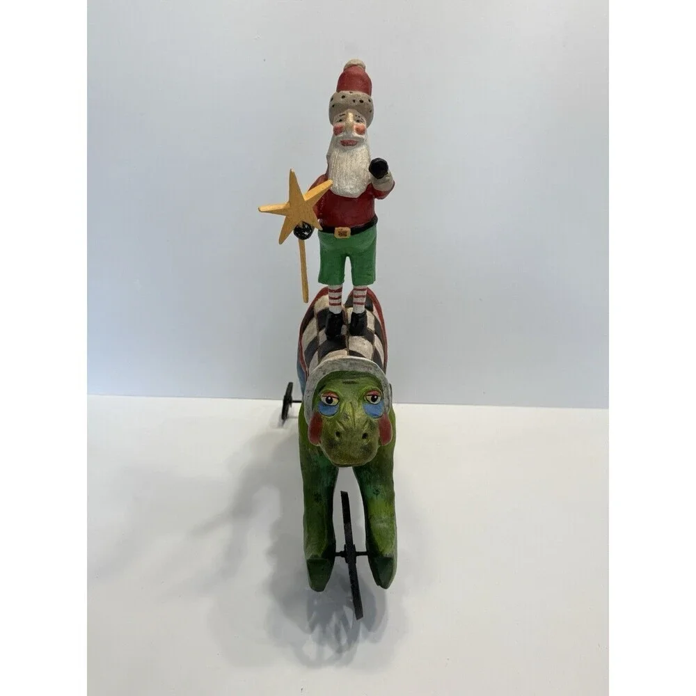 VINTAGE FOLK ART SANTA ON RABBIT WOOD CARVING. PEGGY HERRICK